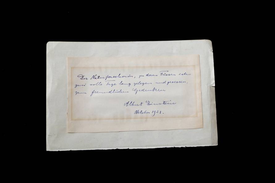A note written by Albert Einstein to Italian chemistry student Elisabetta Piccini in Florence, Italy, in 1921 is seen before it is sold at an auction in Jerusalem