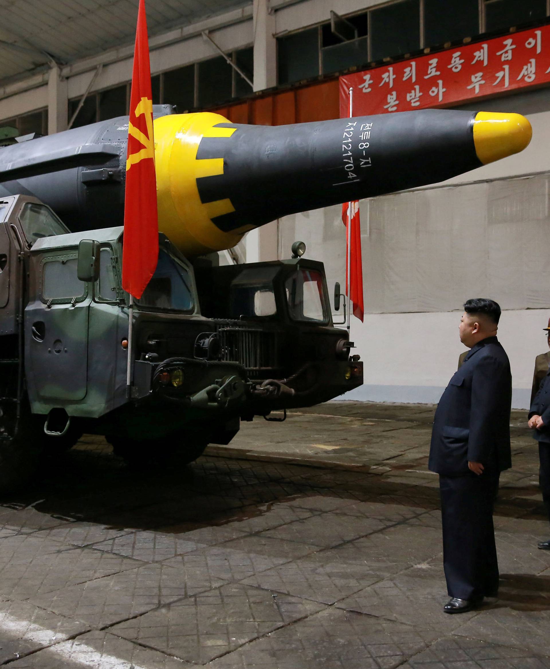 North Korean leader Kim Jong Un inspects the long-range strategic ballistic rocket Hwasong-12 (Mars-12)