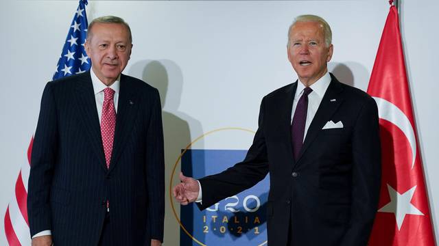 FILE PHOTO: U.S. President Joe Biden and Turkey's President Tayyip Erdogan attend a meeting