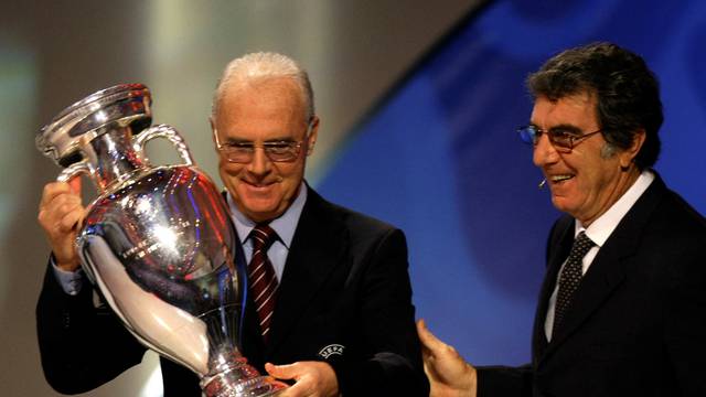 FILE PHOTO: Former Italian goalkeeper Zoff and German soccer legend Beckenbauer hold the UEFA soccer championship trophy in Lucerne