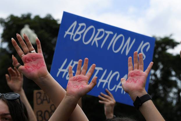 Abortion rights supporters demonstrate outside the United States Supreme Court, in Washington