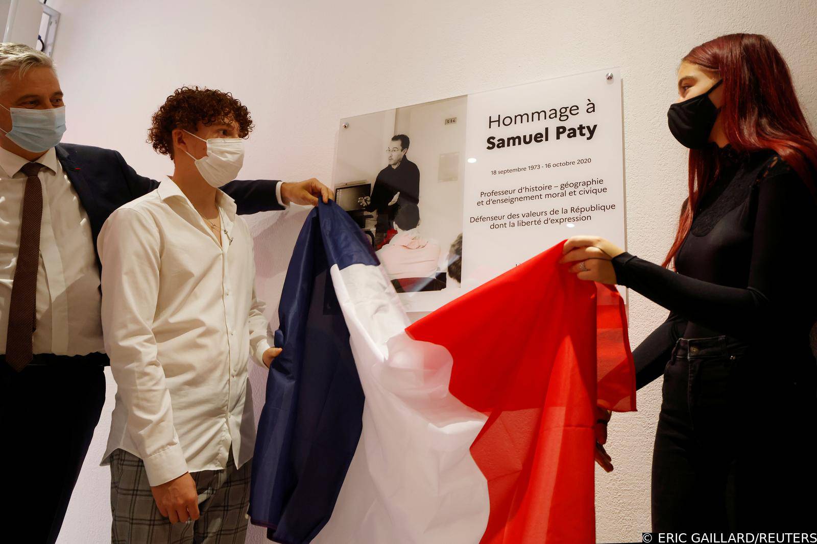 Schoolchildren and teachers pay homage to French teacher Samuel Paty in France