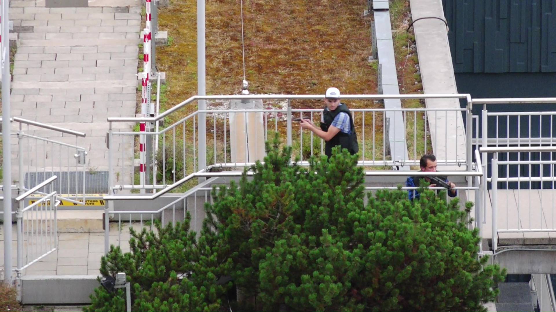 Plain clothes police officers attend scene of shooting rampage in Munich