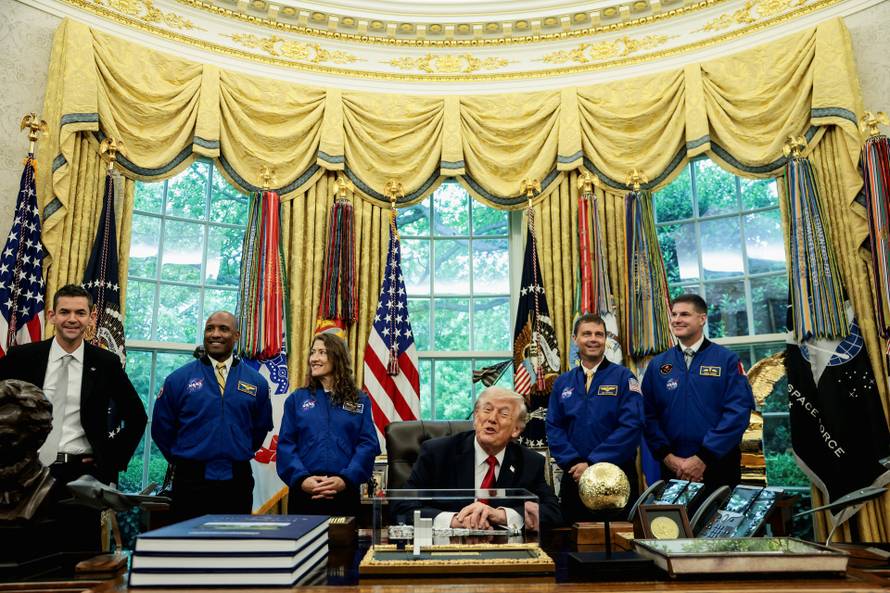 U.S. President Donald Trump meets Artemis II astronauts in the Oval Office at the White House in Washington
