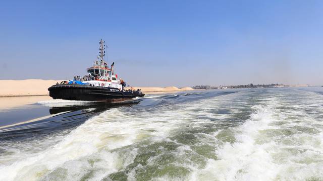 Ship Ever Given leaves the Suez Canal after settlement deal, in Ismailia