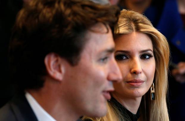 Ivanka Trump looks at Canadian Prime Minister Justin Trudeau during U.S. President Donald Trump