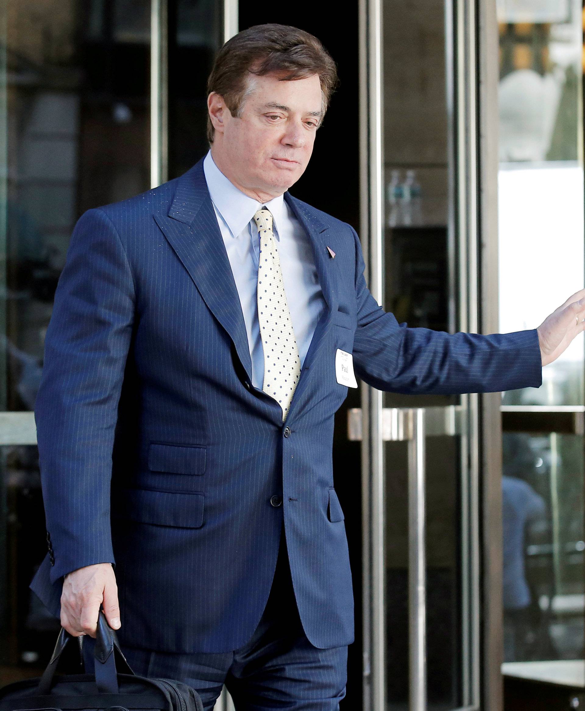 FILE PHOTO: Paul Manafort, senior advisor to Republican U.S. presidential candidate Donald Trump, exits following a meeting of Donald Trump's national finance team in New York