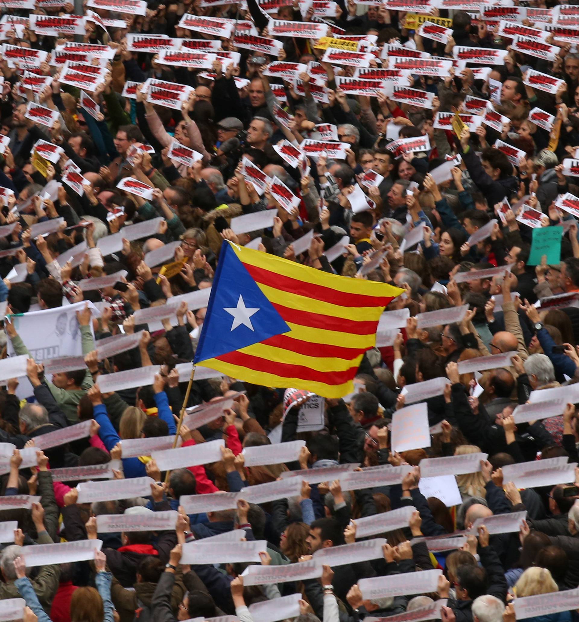 Protesters gather in Sant Jaume square at a demonstration during a partial regional strike in Barcelona