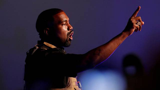 FILE PHOTO: Rapper Kanye West gestures to the crowd as he holds his first rally in support of his presidential bid in North Charleston