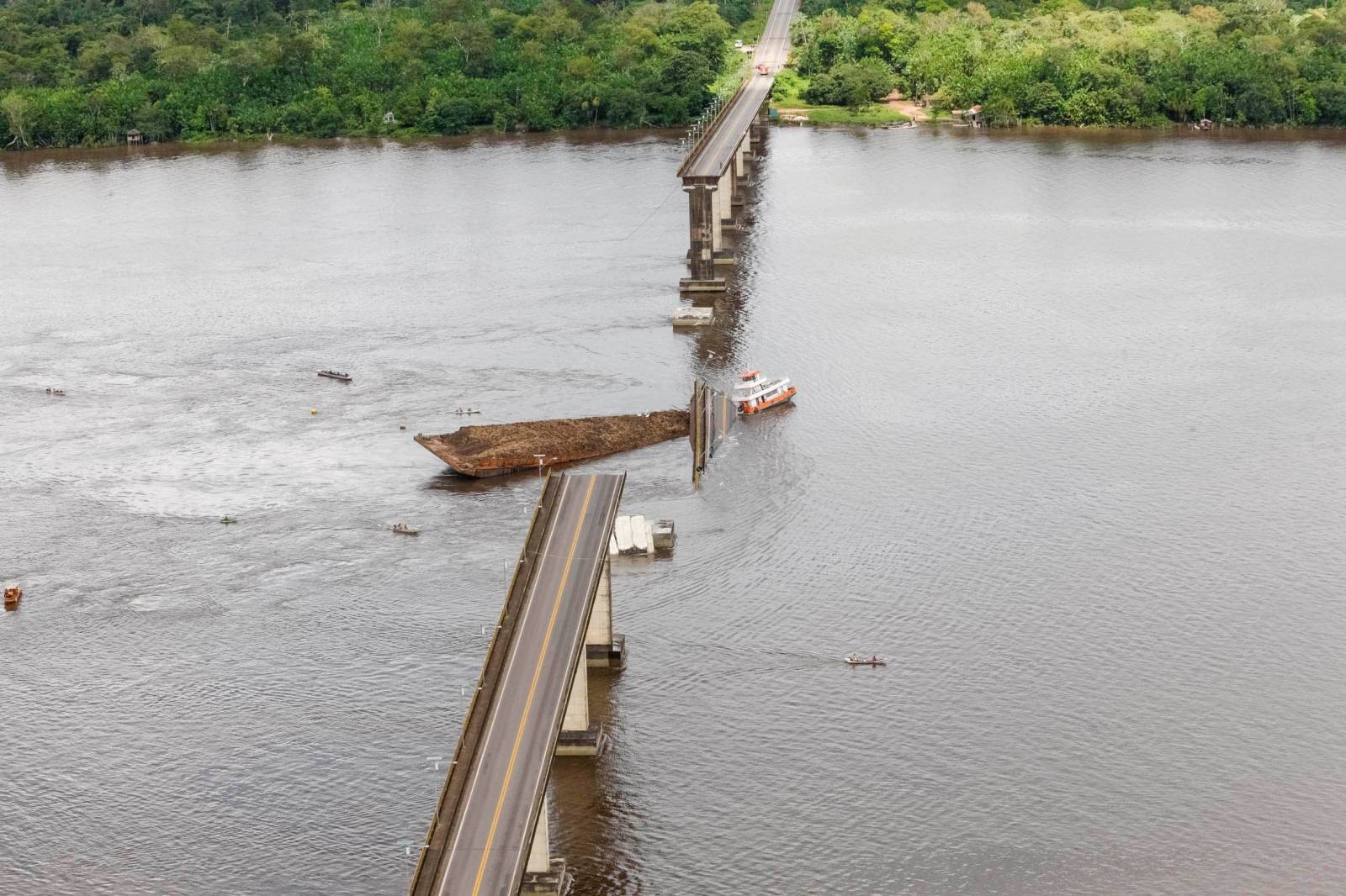A bridge over the Moju River is seen after collapsing in Acara
