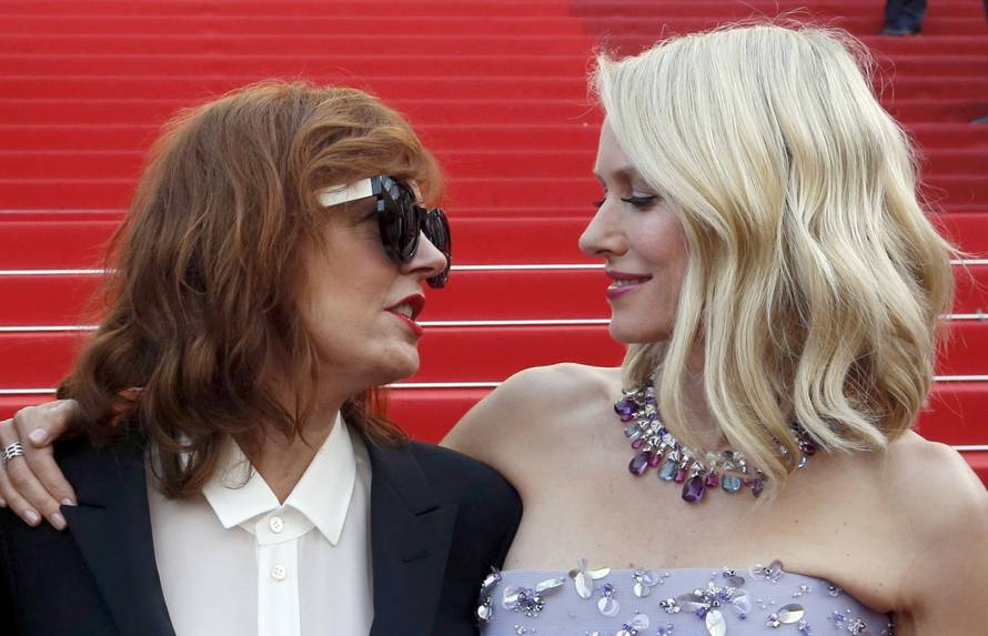 Actresses Susan Sarandon and Naomi Watts pose on the red carpet as they arrive for the opening ceremony and the screening of the film "Cafe Society" out of competition during the 69th Cannes Film Festival in Cannes