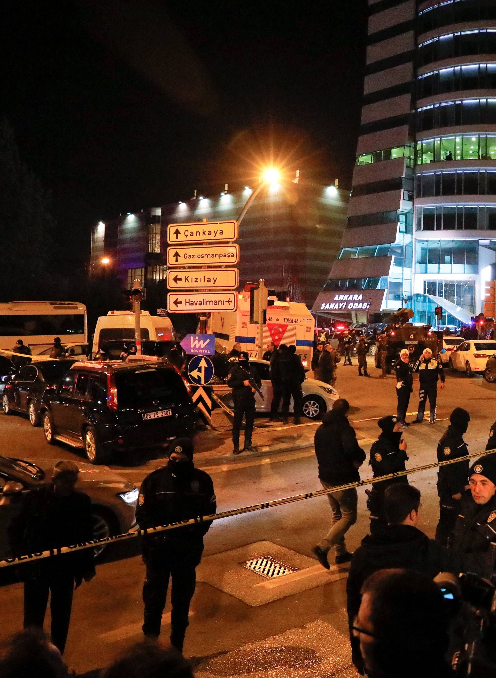 Turkish police secure the area near an art gallery where the Russian Ambassador to Turkey Andrei Karlov was shot in Ankara