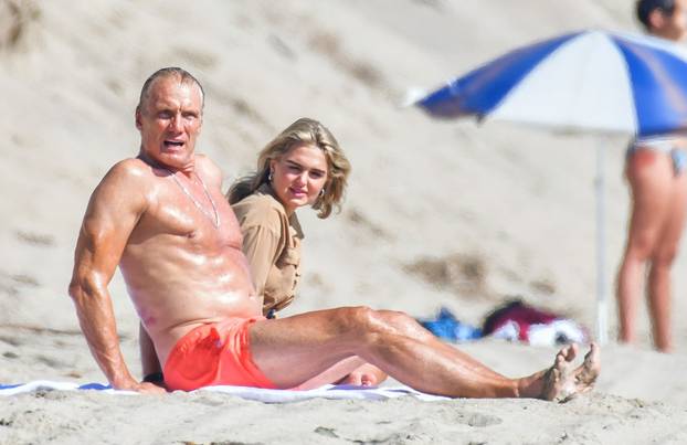 *EXCLUSIVE* Dolph Lundgren and fiancee Emma Krokdal enjoy a sunny beach day date in Malibu!