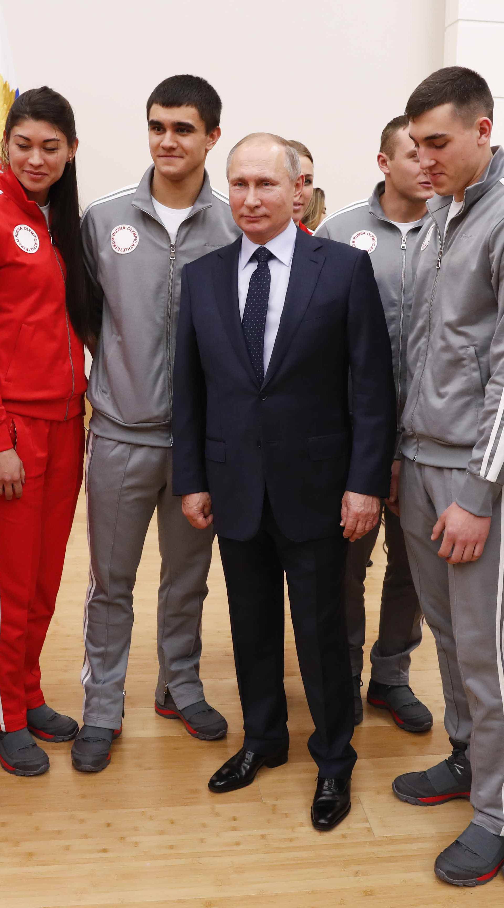Russian President Putin attends a meeting with Russian athletes and team members, who will take part in the 2018 Pyeongchang Winter Olympic Games, outside Moscow