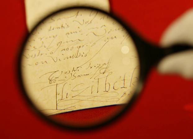 FILE PHOTO: Letter written by Queen Elizabeth I of England is inspected at Christies auctioneers in London