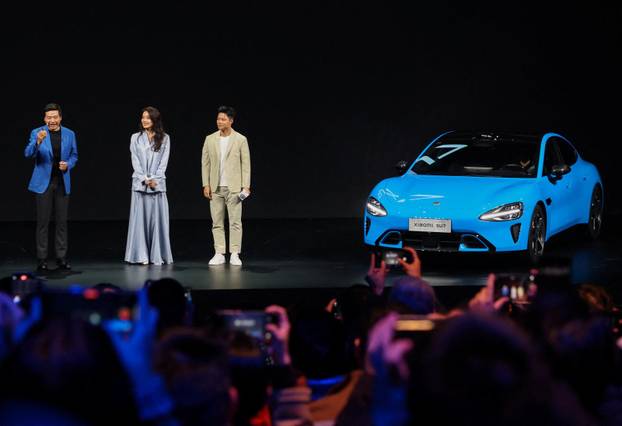 Chinese tech giant Xiaomi unveils new generation of SU7 electric vehicle, in Beijing