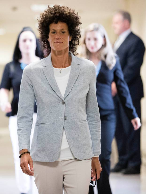 Andrea Constand walks to the courtroom during Bill Cosby