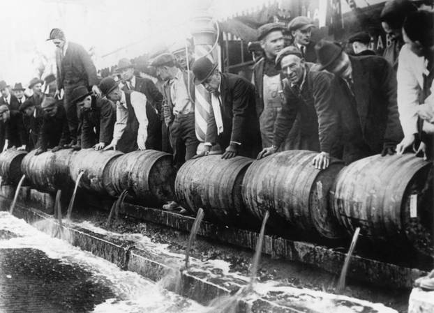 Police Emptying Beer Barrels During Prohibition