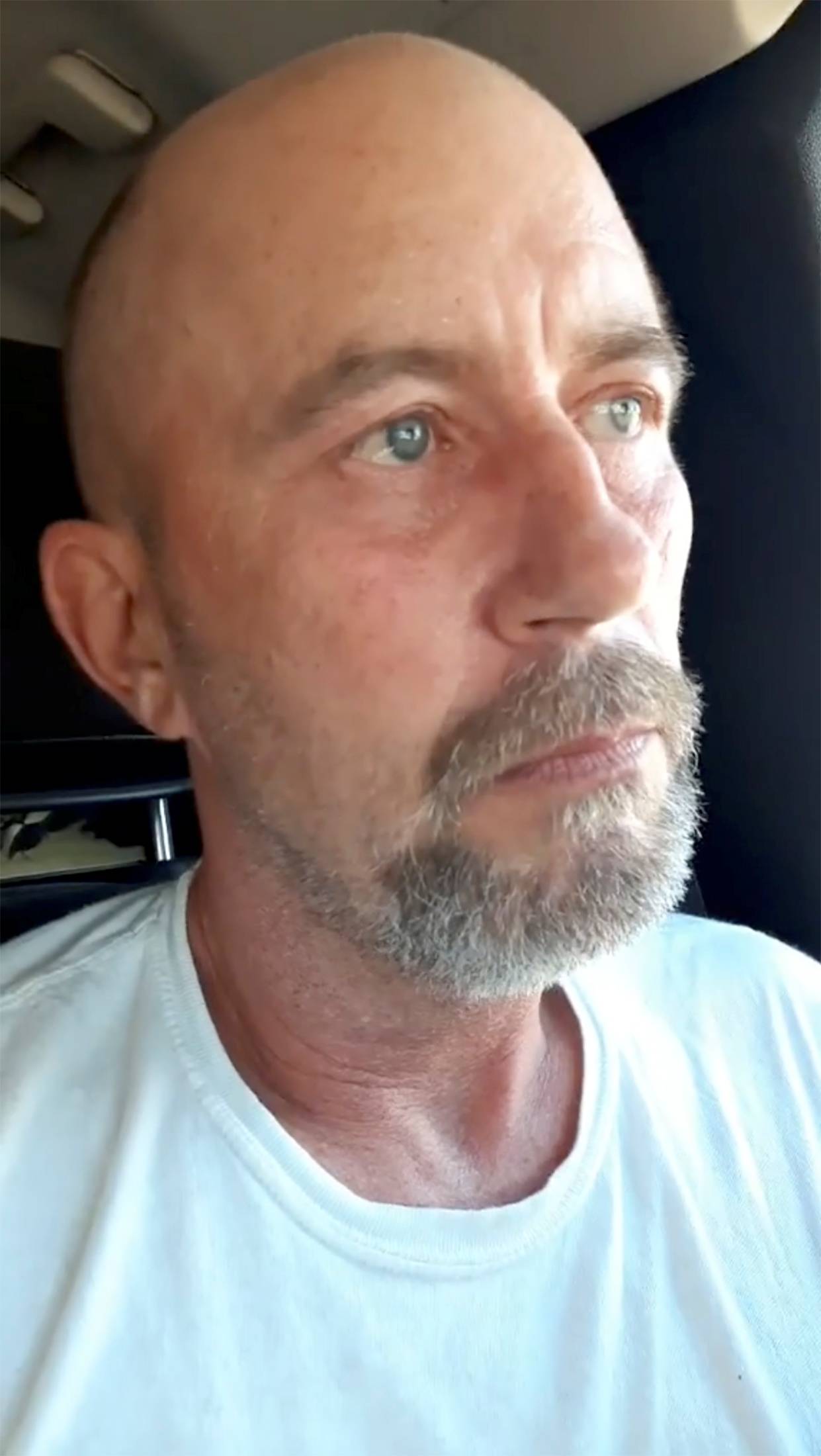 A man who claims to be sitting in his truck with explosives speaks during a Facebook livestream