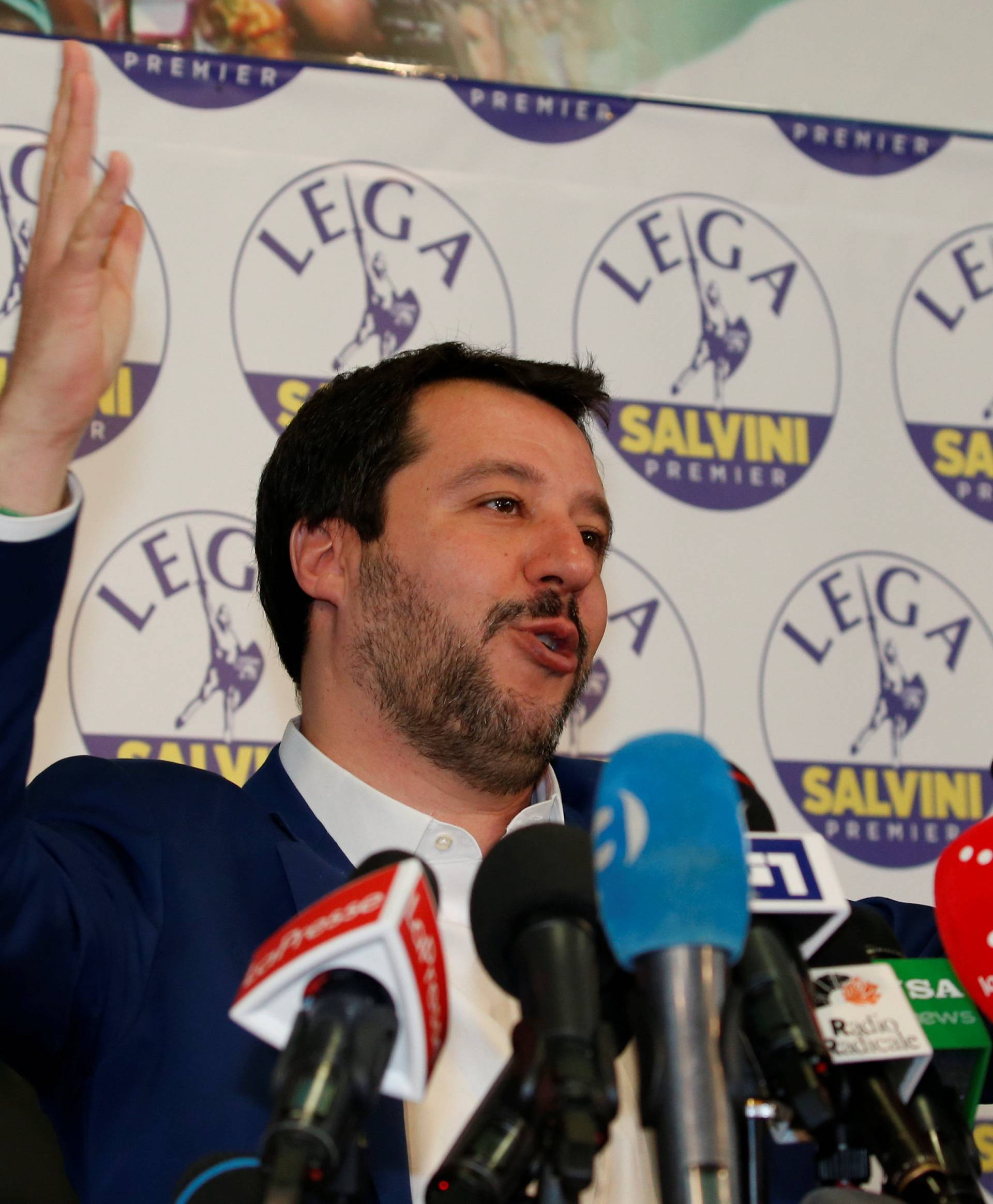 Northern League party leader Matteo Salvini gestures as he talks during a news conference, the day after Italy's parliamentary elections, in Milan