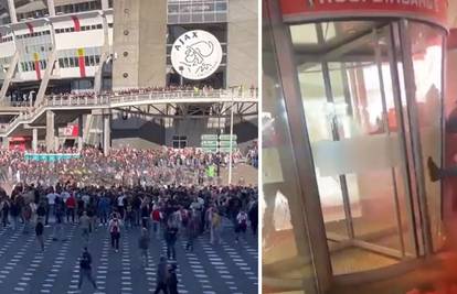 VIDEO Huligani Ajaxa bocama i kamenjem gađali policiju. Htjeli su provaliti u prostorije kluba
