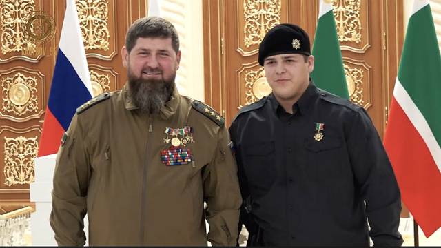 Adam Kadyrov, 15, awarded Hero of Chechnya. Adam Kadyrov, 15, awarded Hero of Chechnya. Pictured: Ramzan Kadyrov (left), his son Adam Kadyrov (right)