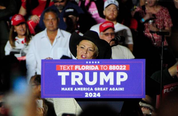 *EXCLUSIVE* Roseanne Barr walks with a mystery man's arm around her as she speaks at a Trump Rally for the first time