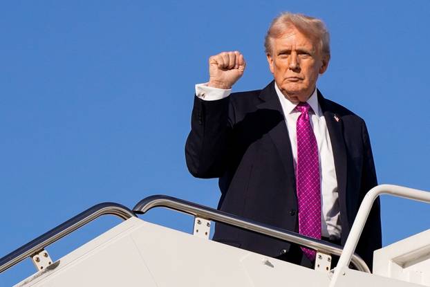 U.S. President Donald Trump boards Air Force One en route to Florida, at Joint Base Andrews