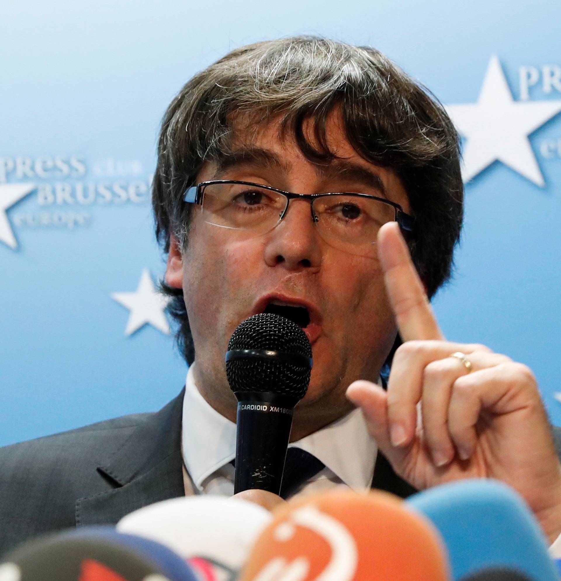 Sacked Catalan leader Carles Puigdemont attends a news conference at the Press Club Brussels Europe in Brussels