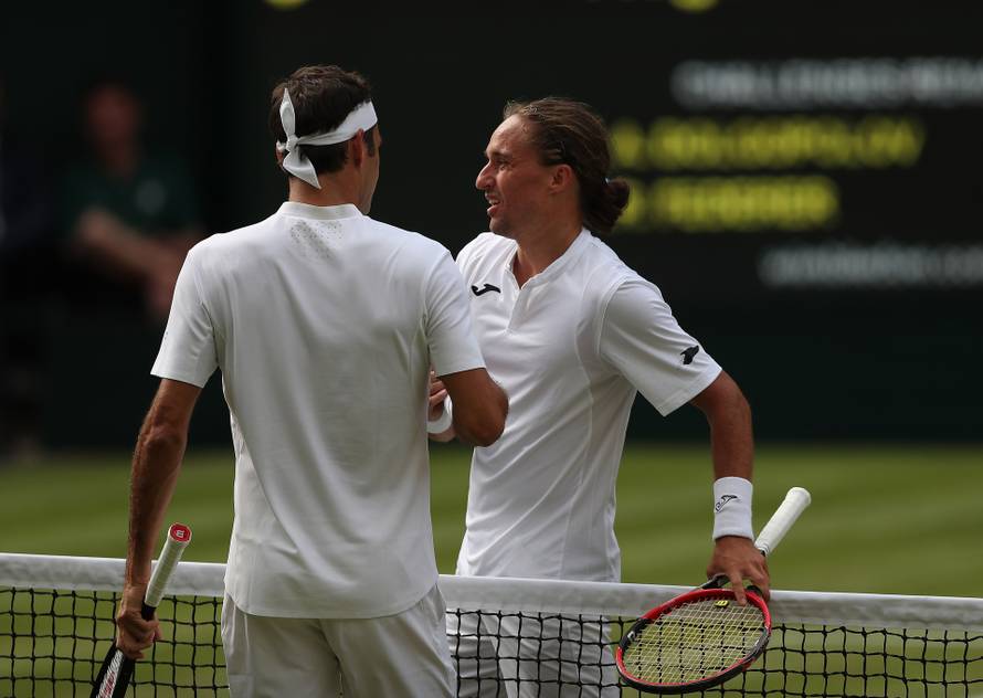 London:  Wimbledon, Roger Federer - Alexandr Dolgopolov