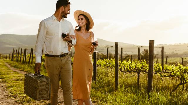 Couple on a day out walking in a vineyard