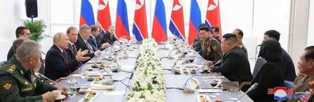 North Korean leader Kim Jong Un and Russia's President Vladimir Putin attend a banquet