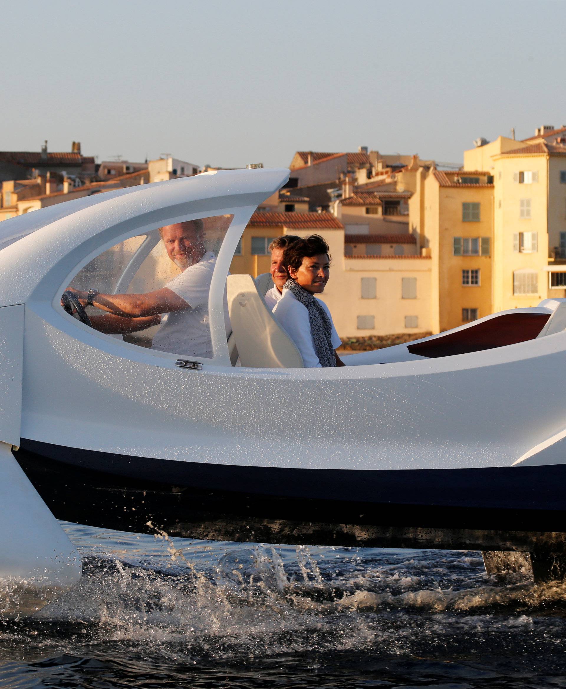 SeaBubbles executives are seen aboard prototype of their water taxi in the harbour of Saint-Tropez