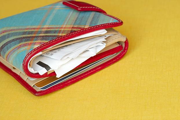 Close-up,Of,A,Wallet,Which,Contains,Some,Cards,And,Lots