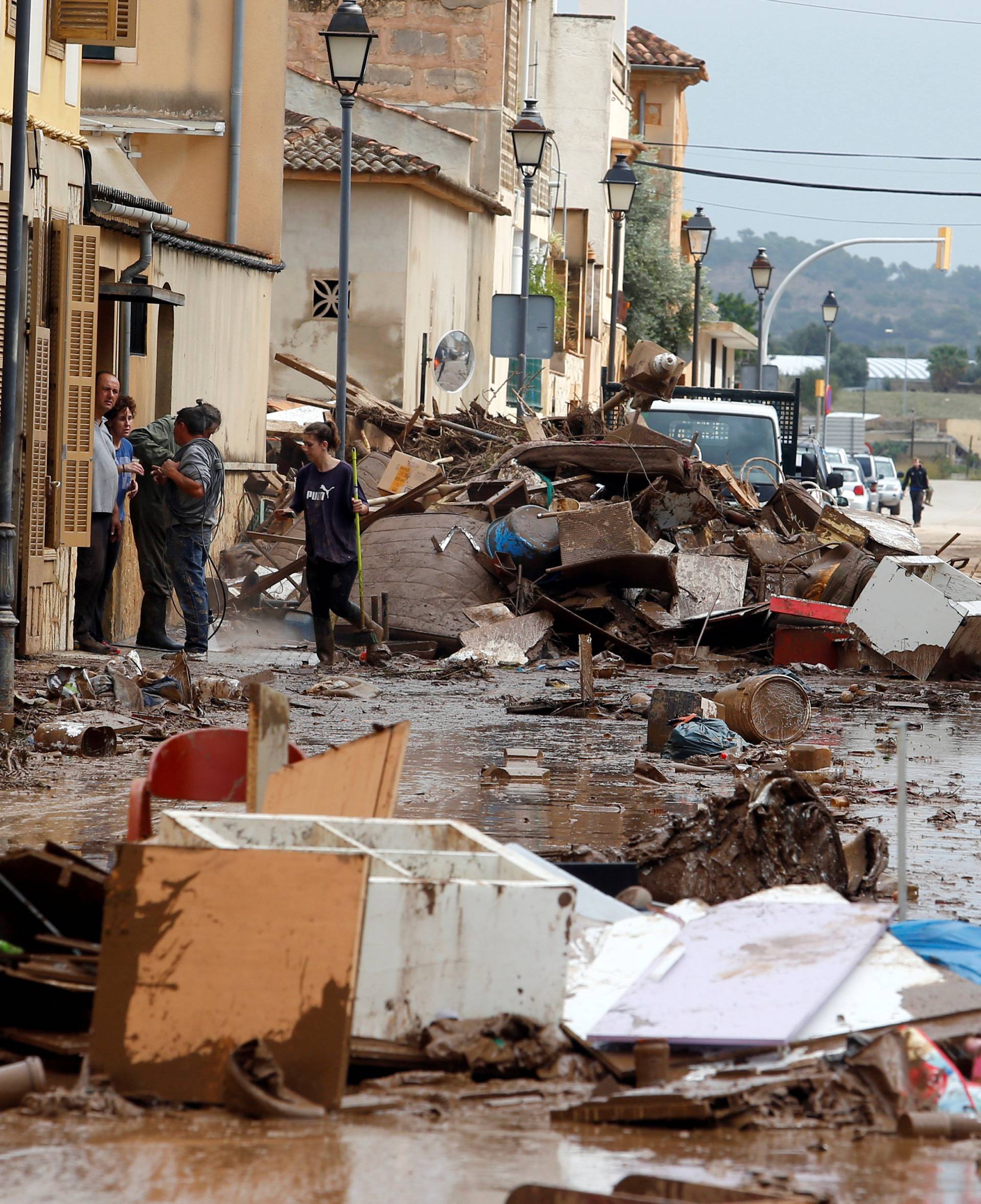 Debris is seen on the street as heavy rain and flash floods hit Sant Llorenc de Cardassar on the island of Mallorca