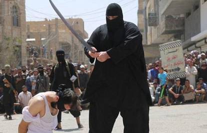 Sije strah u ime ISIL-a: Div od 130 kg sabljom odsjeca glave