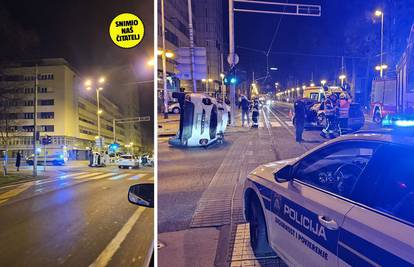 VIDEO Krš i lom u Zagrebu.  Auto završio na boku nakon nesreće. Policija: Ozlijeđena maloljetnica