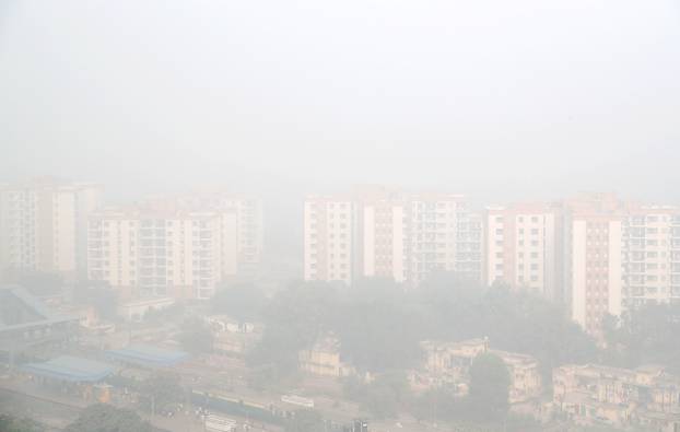 Apartment blocks during heavy smog in Delhi