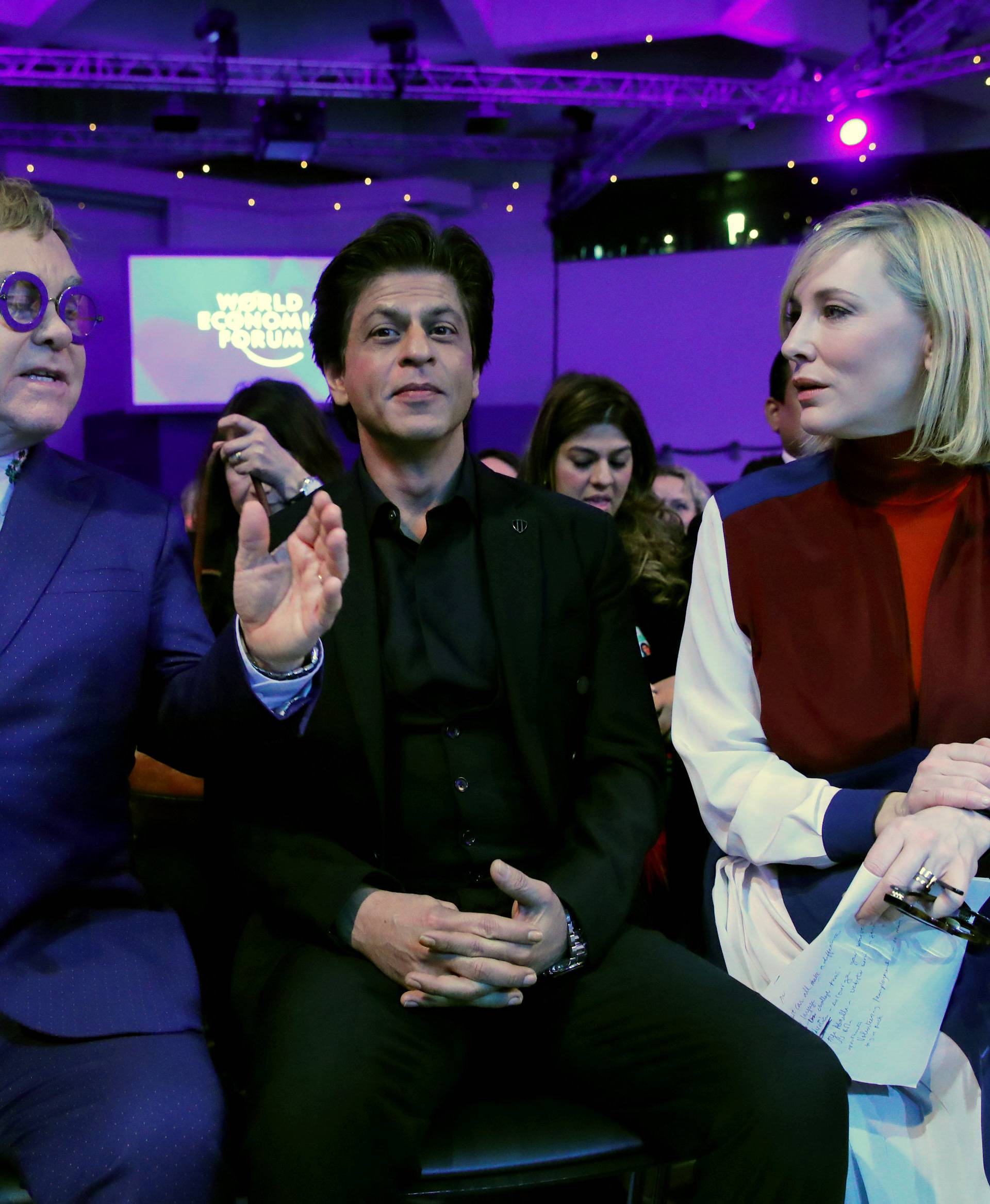 Actor Cate Blanchett, actor Shah Rukh Khan and singer Elton John are pictured at the Crystal Awards ceremony of the annual meeting of the World Economic Forum (WEF) in Davos