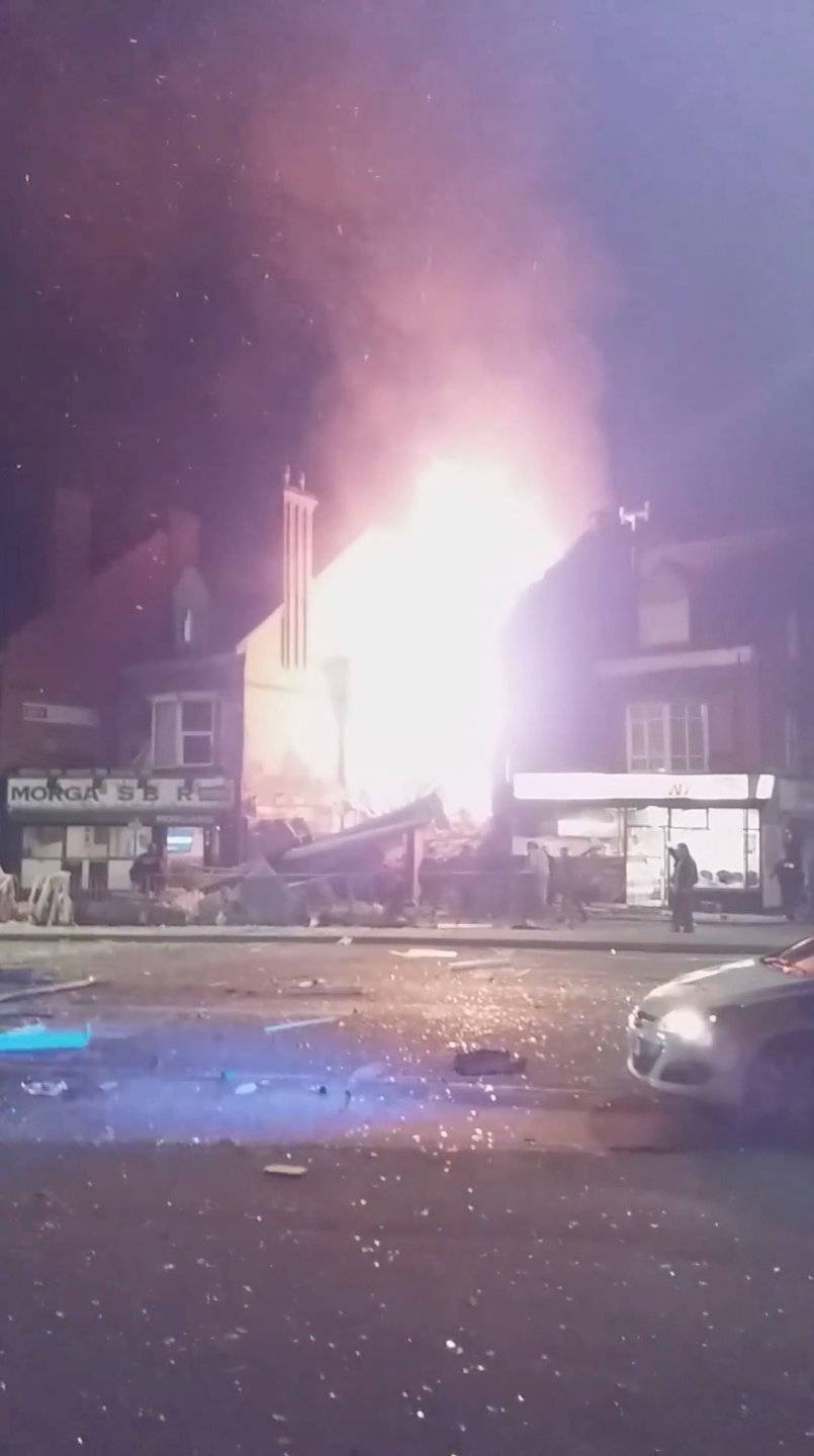 Flames leap into the sky from the site of an explosion in Leicester