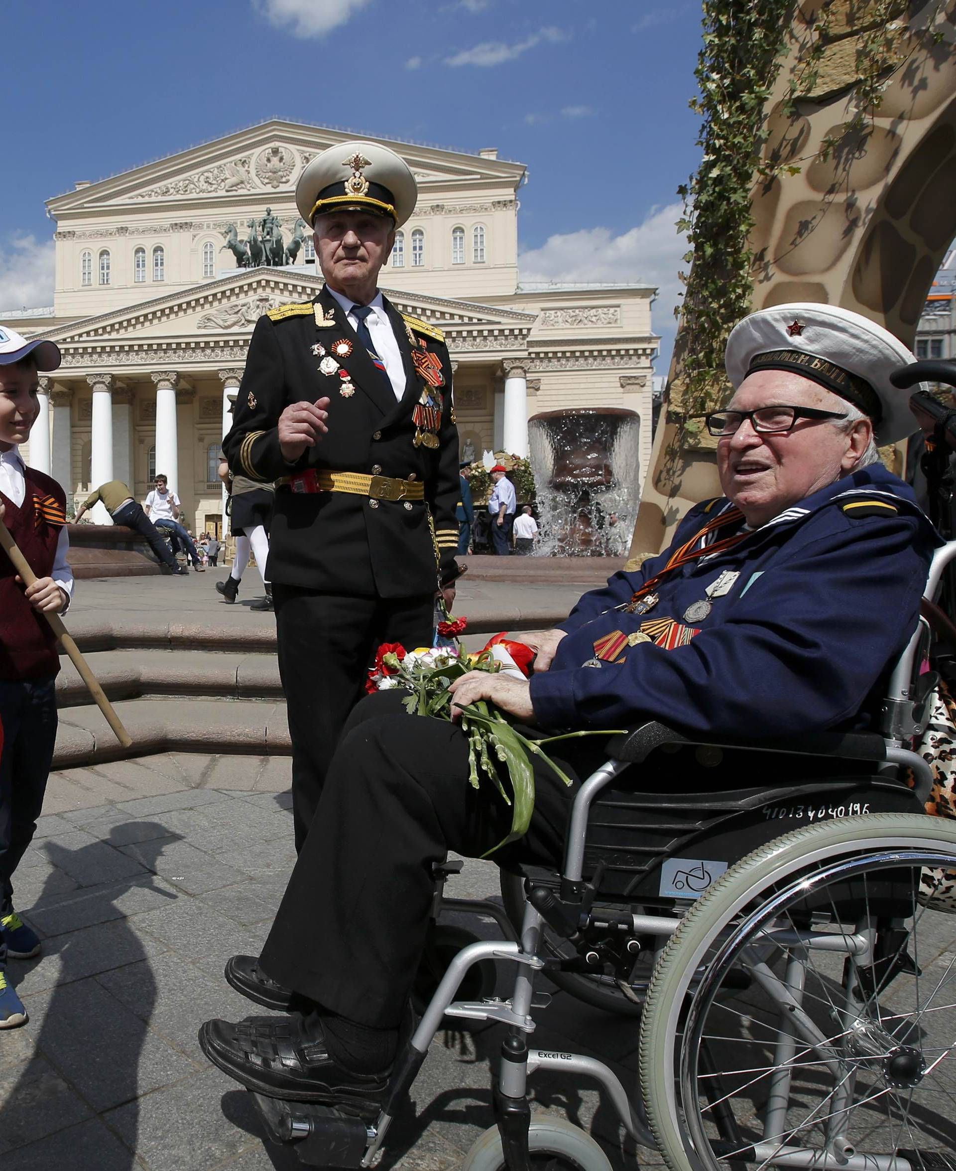 Veterans take part in Victory Day celebrations to mark end of World War Two in central Moscow