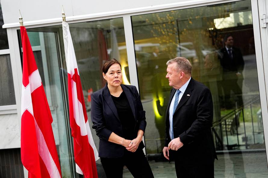 Denmark's Foreign Minister Lars Loekke Rasmussen and Greenland's Foreign Minister Vivian Motzfeldt prepare for meeting at the White House
