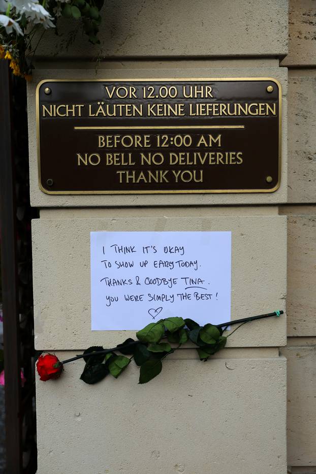 People lay flowers and candles in front of the home of late singer Tina Turner in Kuesnacht