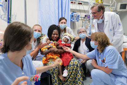 Two-year-old conjoined twins separated by Italian doctors in rare surgery in Rome