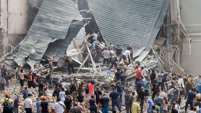 Rescuers work at Ohmatdyt Children's Hospital that was damaged during a Russian missile strikes, in Kyiv