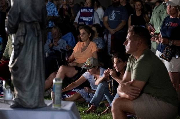 Catholics from across the Phoenix area gather to pray for Charlie Kirk, who was shot and killed in Utah, at Desert Horizon Park in Scottsdale