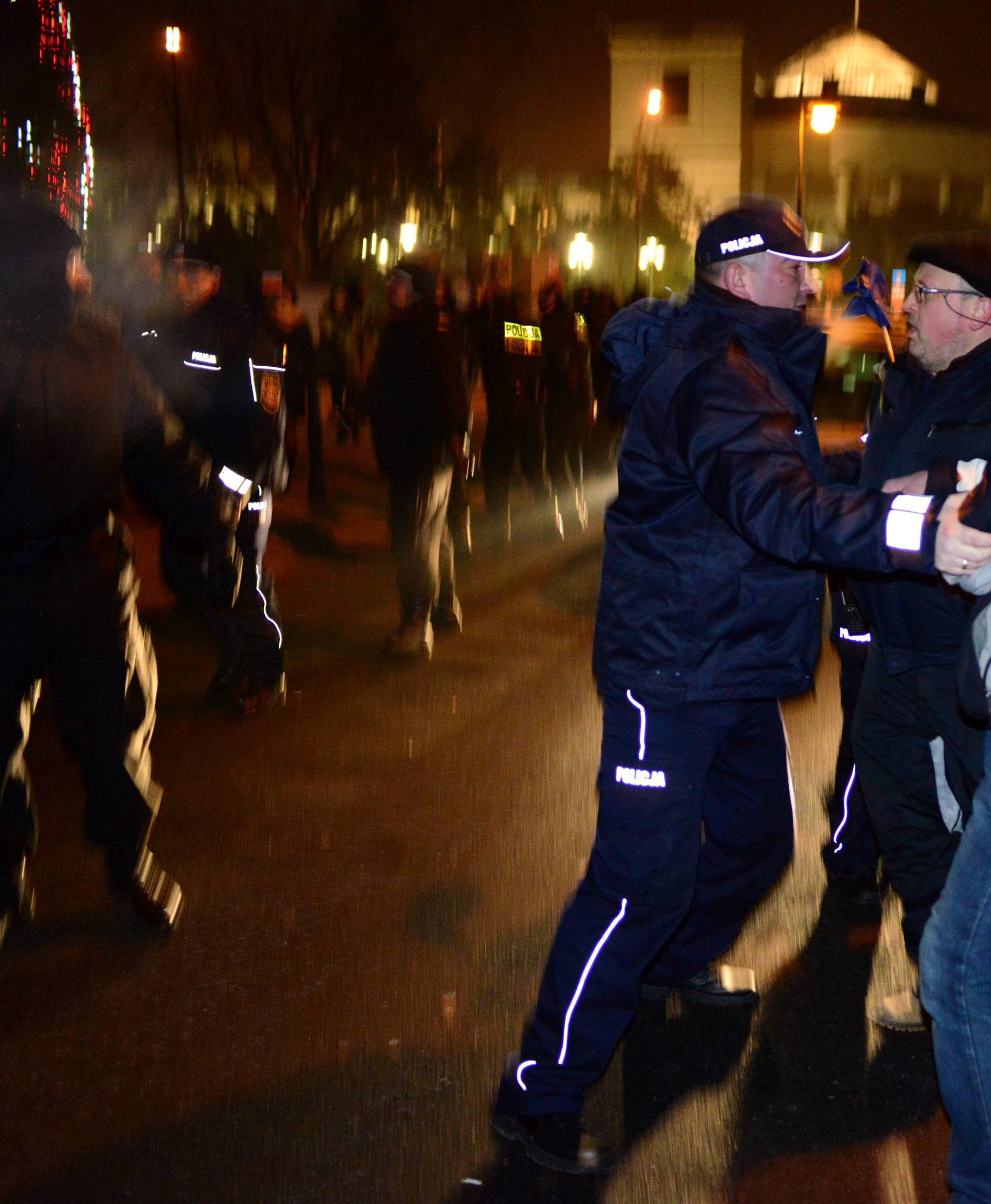 Protesters try to block the exit of the Polish Parliament in Warsaw