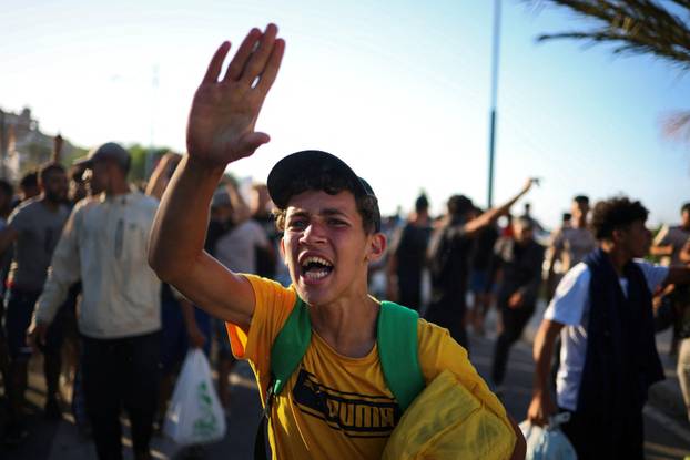 Mass crossings of migrants on foot and by sea from Morocco into Spanish territory, in Ceuta