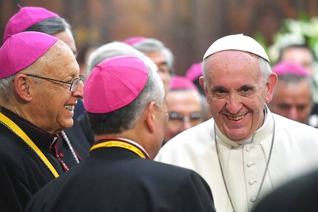 Pope Francis meets with bishops in the sacristy of the Cathedral of Santiago, in Santiago
