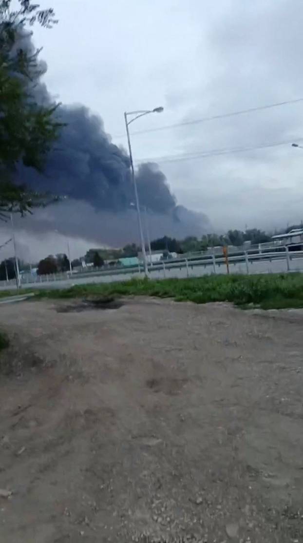 Smoke rises from a fire at an oil refinery following a Ukrainian drone attack, in Samara